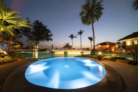 Illuminated swimming pool on Koh Chang Island, Andaman Sea, Southern Thailand, Thailand