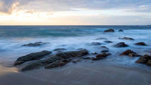 Sunrise on the beach, coast near Sadah, Oman