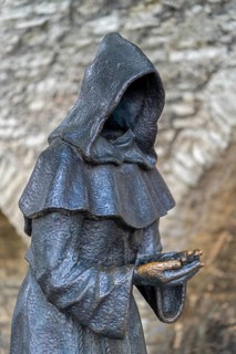 Monk sculpture, one of three bronze statues of faceless monks at the Danish King's Garden in the