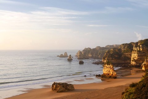 Rocky coast and beach, Praia Dona Ana, Lagos, Algarve, Portugal