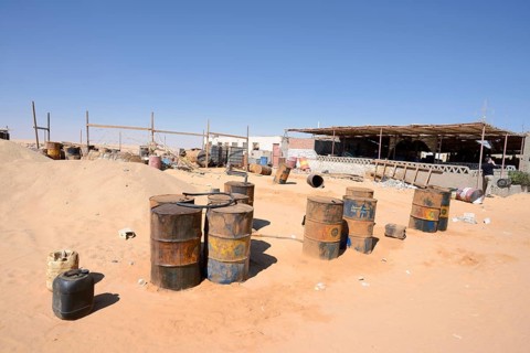 Empty kerosene barrels at a gas station in the Arabian Desert, Egypt
