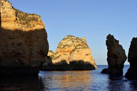 Rocky coast in evening light, Ponta da Piedade, Lagos, Algarve, Portugal