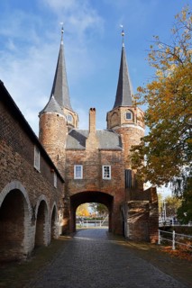 Oostpoort city gate in autumn, Delft, South Holland, Netherlands