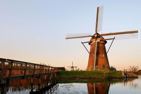 Historic windmills in the evening light, UNESCO World Heritage Site, Kinderdijk, South Holland,