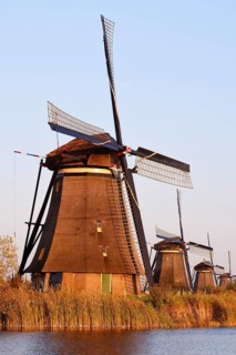 Historic windmills in the evening light, UNESCO World Heritage Site, Kinderdijk, South Holland,