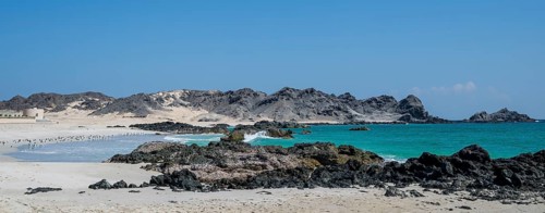 White sandy beach, secluded bay, turquoise blue sea, Omabn