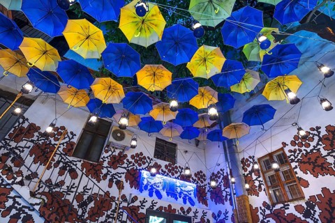 Umbrellas as decoration in a courtyard of a restaurant, Czernowicz, Ukraine