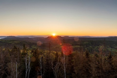 Sunrise at Bernhardstein viewpoint with views of Pfaffenstein and Gohrisch, Saxon Switzerland,