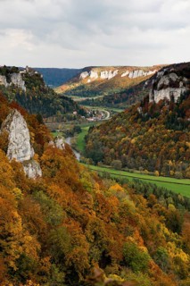 Autumnal forest and Werenwag Castle, Eichfelsen viewpoint, near Irndorf, Upper Danube nature park