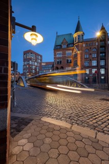 Road traffic in Speicherstadt at blue hour, Hamburg, Germany