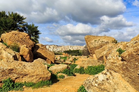 View through boulders of the modern city of Agrigento, Valley of the Temples, Agrigento, Sicily,