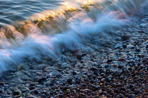 Wave play at sunrise on the chalk coast in Jasmund National Park, Rügen, Sassnitz,