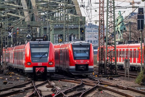 Rail system in front of Cologne Central Station, Hohenzollern Bridge across the Rhine, RRX,