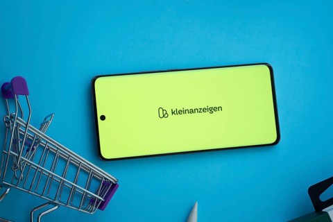 Dhaka, Bangladesh- 03 July 2025: Smartphone displaying Kleinanzeigen logo with shopping cart on a