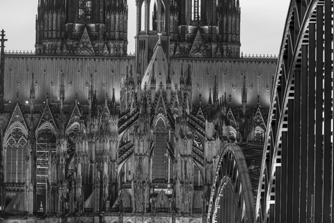 Evening atmosphere, Cologne Cathedral illuminated with LED lamps and the Hohenzollern Bridge,