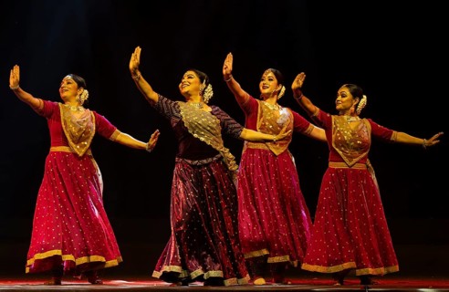 Artists perform a classical dance during a cultural evening program at Shilpgram Mohotsav 2026 in