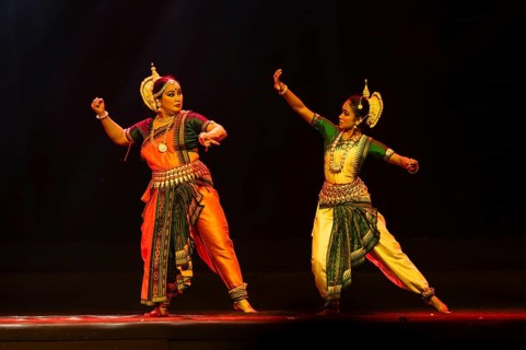 Artists perform Odissi classical dance during a cultural evening program at Shilpgram Mohotsav 2026