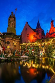 Houses illuminated and decorated for Christmas, Christmas market, blue hour, Eguisheim, Haut-Rhin