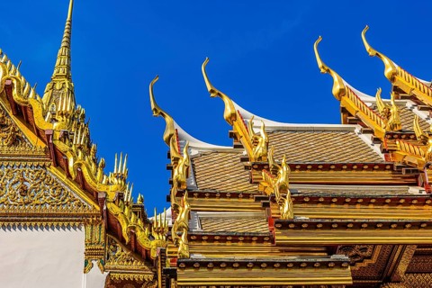 The Grand Royal Palace, the gilded Abhorn Bimok Pavilion with overlapping roofs and curved chofas,