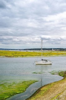 Boats and Marshes over Hurst Spit, Milford on Sea, Lymington, Hampshire, UK