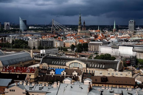 View of Riga with a combination of market buildings and distinctive church towers, Riga, Latvia,