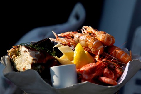 Appetizing seafood dish with crustaceans presented in the restaurant, Smögen, Västra Götaland,