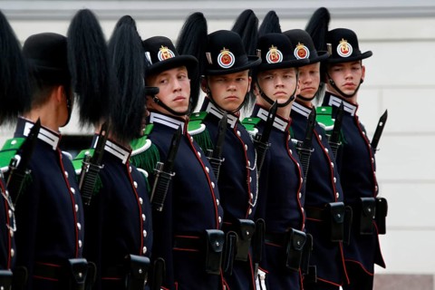 Ceremonial changing of the guard with soldiers in uniform at the Royal Palace in Oslo, Oslo,