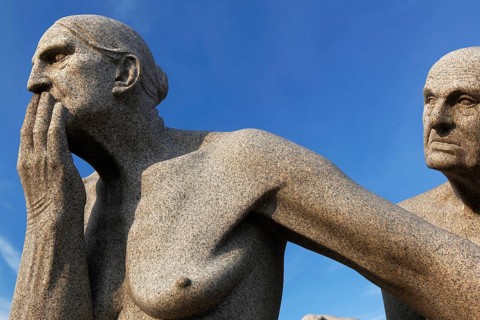Two granite figures depict thoughtful and complex interaction, Oslo, Norway