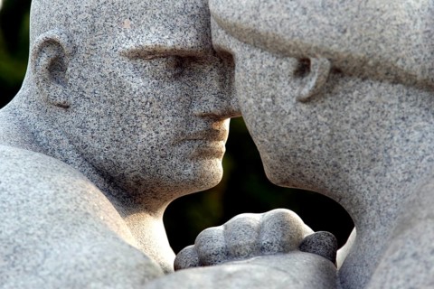 Group of granite figures showing two people facing each other in intensive proximity, Oslo, Norway