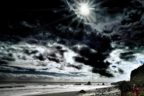 Dramatic beach with dark skies in Greymouth, New Zealand, Greymouth, West Coast, New Zealand