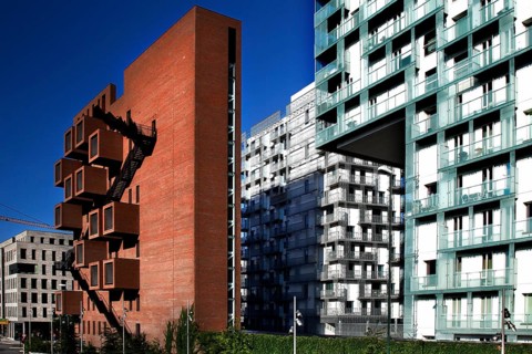 Modern new buildings in Oslo with brick and glass facades under clear blue skies, Oslo, Bydel Gamle