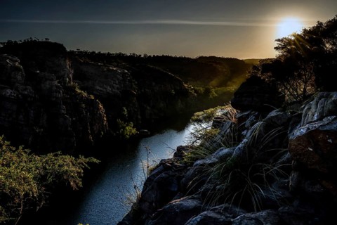 Dramatic gorge with river at sunset, captivating and mysterious atmosphere, zero