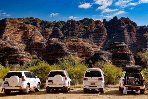 Car park in front of the beehive-like sandstone cliffs in Purnululu National Park, Purnululu