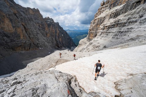 Three climbers descending the Sentiero Martinazzi, Camosci Valley, Brenta Mountains,