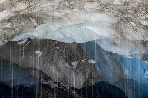 Meltwater at a glacier cave, underground glacier stream, Castner Glacier, Delta Range, Alaska