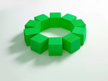 10 green wooden cubes against a white background
