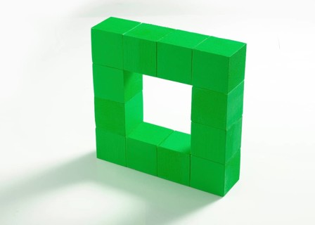 12 green wooden cubes against a white background
