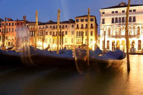 Gondolas and palaces on the Grand Canal, Venice, Veneto, Italy