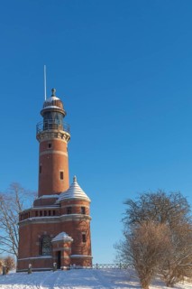 Holtenau lighthouse at the entrance of the Kiel Canal in winter, west bank of the Kiel Fjord,