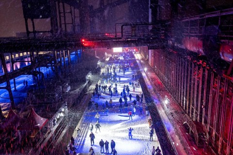 Ice rink at the Zollverein coking plant, ice skating with music and many lighting effects, Essen,
