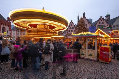 December 22, 2025, Frankfurt Christmas Market on Roemerberg with the skyline in the background at