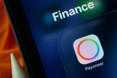 16 Nov 2025- Dhaka, Bangladesh: Close-up of Payoneer app icons on a iPad screen