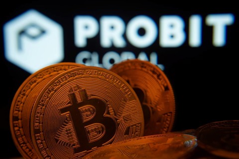Dhaka, Bangladesh- 27 Mar 2025: Close-up of Bitcoin coins with the ProBit Global logo visible on a