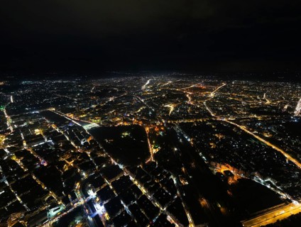A Drone night view of Aleppo, Syria on December 19, 2025, showing illuminated streets, dense