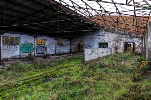 Former hall, dilapidated plant of a former agricultural production cooperative of the former GDR,
