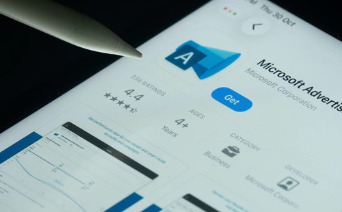 Dhaka, Bangladesh- 30 Oct 2025: Microsoft Advertising app on a iPad screen with a pen pointing at
