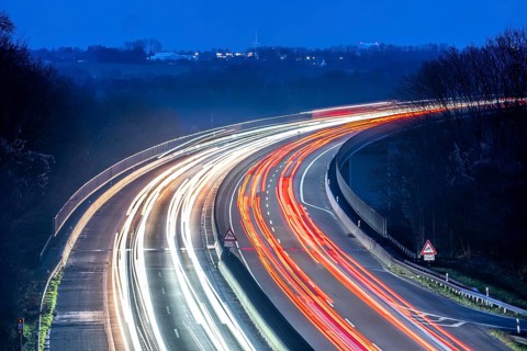 Evening traffic on the A52 motorway, between Düsseldorf and Essen, at the Ruhr Valley Bridge,