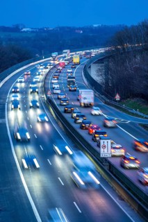 Evening traffic on the A52 motorway, between Düsseldorf and Essen, at the Ruhr Valley Bridge,