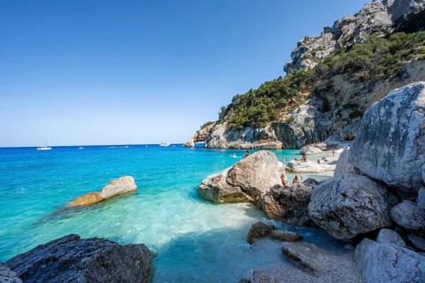 Light blue clear sea on a dream beach on Cala Goloritzé, picturesque rocky coast, cliffs with rock