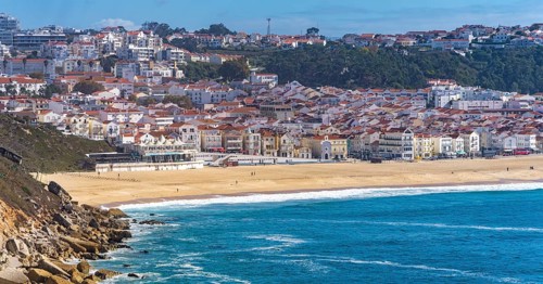 View from Leuct Tower towards orange tiled roofs in the town of Nazare, Estremadura, Portugal